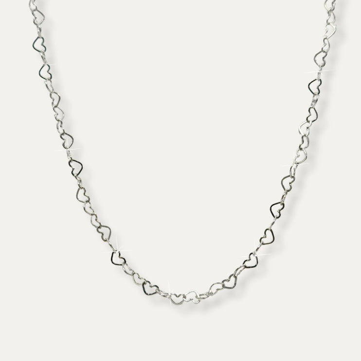 Cadena. Cadena de plata. Cadena para mujer. Cadena de moda. Cadenas 2025. Cadenas de plata para mujer. Cadena 2025. Cadena collar. Collar tiffany. Tous. Cadena joyería. Cadena de plata corazones enlazados. Plata esterlina. Plata ley 925. Plata pura. Plata 925.